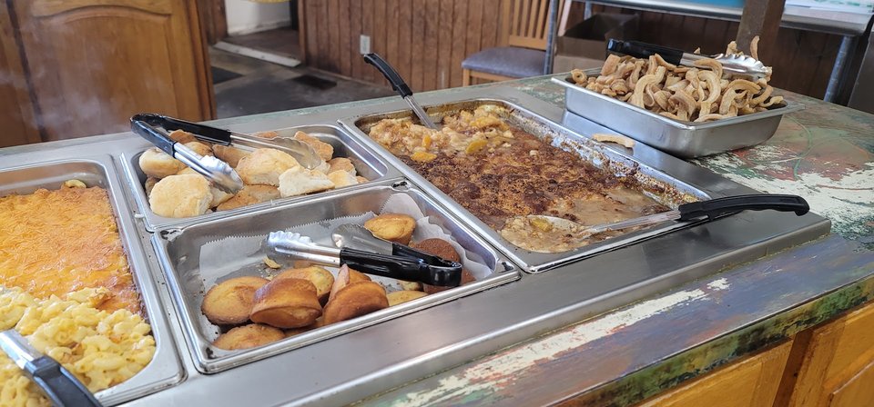 Lunch plates beside a salad bar